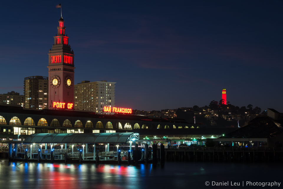The Ferry Building and the Coit Tower are illuminated in red to celebrate the 49ers post season run.