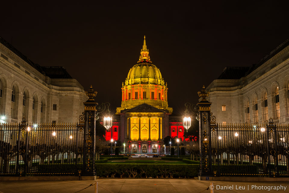 San Francisco's city hall in red and gold celebrating the 49ers post season run.